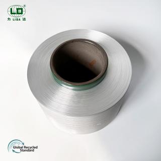 How does recycled yarn achieve a 70% reduction in carbon emissions?